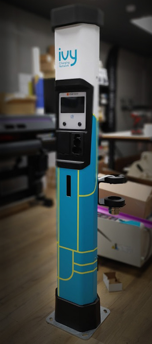 Custom vinyl wrap for EV charging station with branded graphics and durable printed finish in Toronto GTA