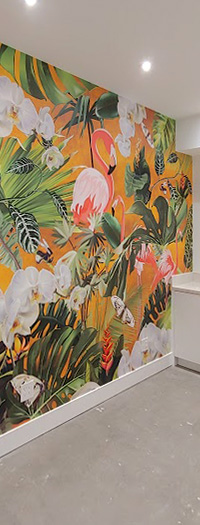 Custom tropical accent wall mural installed in modern interior space Custom tropical accent wall mural installed in modern interior space